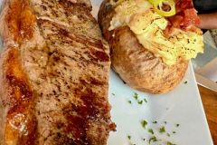 Top-Sirloin-Steak-with-Double-Baked-Stuffed-Potato-and-Chimchurri-Sauce.-One-of-the-best-Family-Restaurants-in-Sosua