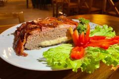 Bacon-Wrapped-Cheese-Stuffed-Meatloaf-Smoked-at-Toro-Loco-Restaurant-in-Sosua