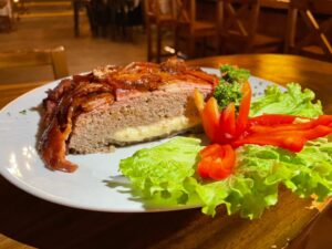 Bacon Wrapped Cheese Stuffed Meatloaf Smoked at Toro Loco Restaurant in Sosua